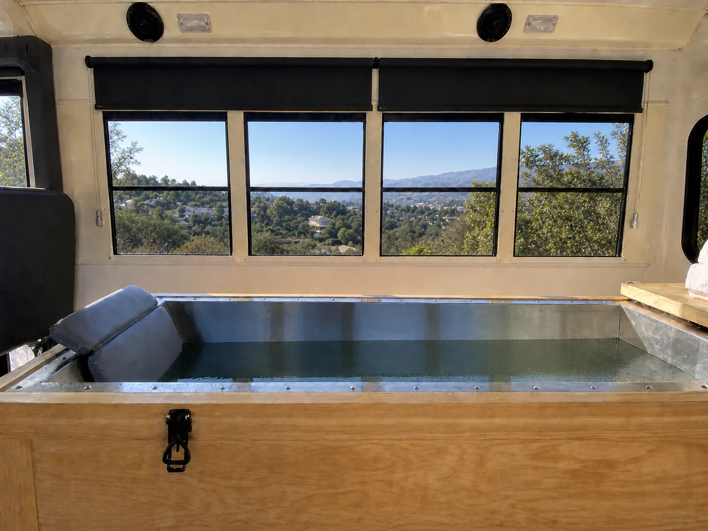 The Ice Well mobile cold plunge tub inside the studio vehicle